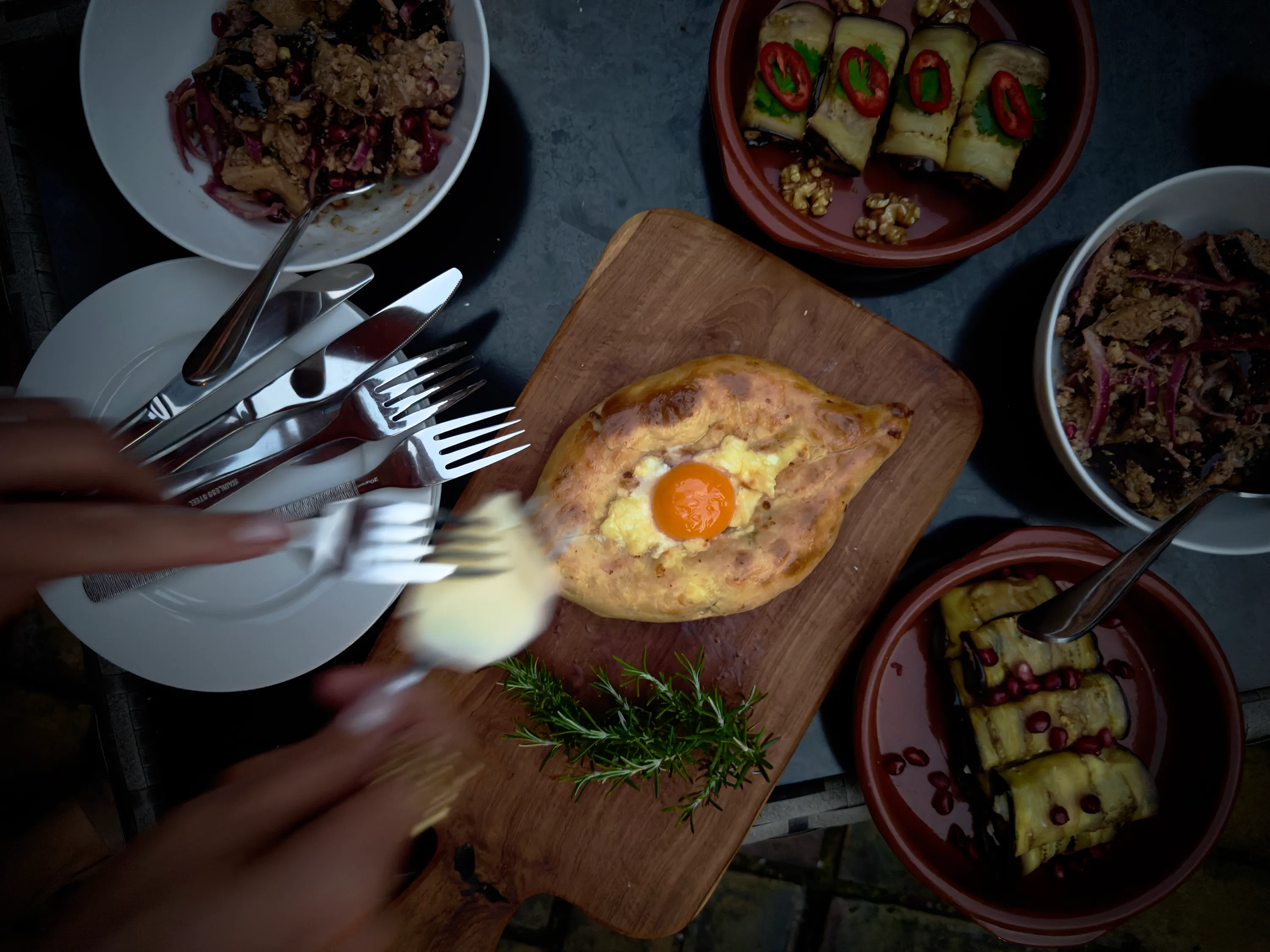 Eating a Khachapuri in London with a Georgian Aubergine Salad Behind